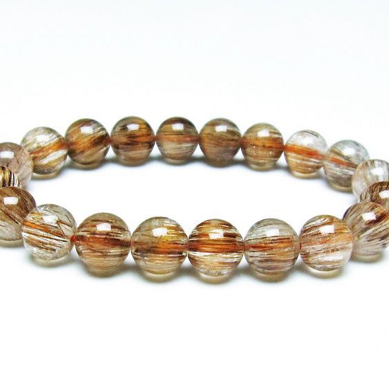 キャツアイルチル ルチルクォーツキャッツアイ ブラジル産 9.43ct / 12.8x12.8mm前後