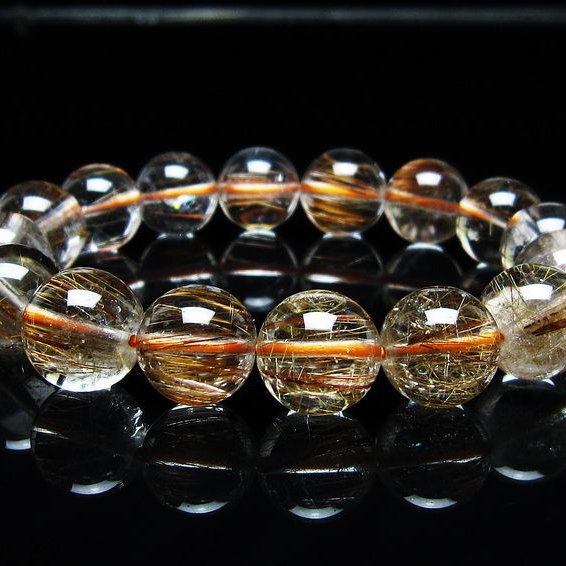 ギッシギシのキャッツアイルチルたん ルチルクォーツキャッツアイ ブラジル産 9.43ct[240125643]12.8